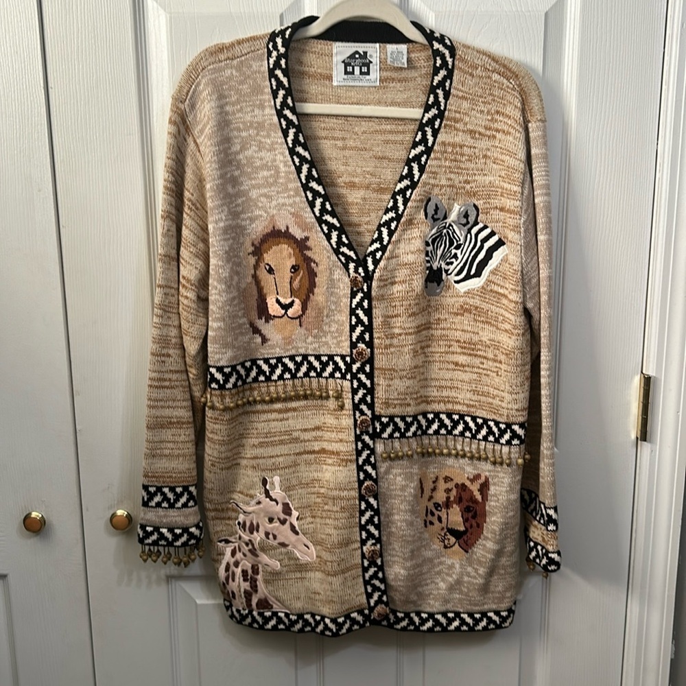 Storybook Knits cardigan. Size L. Animal print.